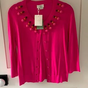 Pink Kate Spade sweater with embellished jewels